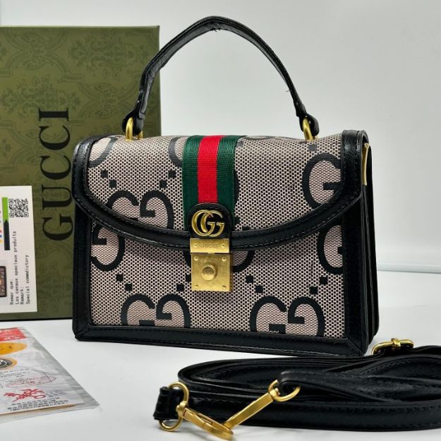 صورة كروس جوتشي مع علبه Gucci